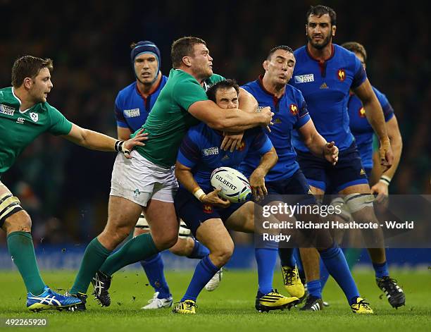 Morgan Parra of France is high tackled by Jack McGrath of Ireland during the 2015 Rugby World Cup Pool D match between France and Ireland at...