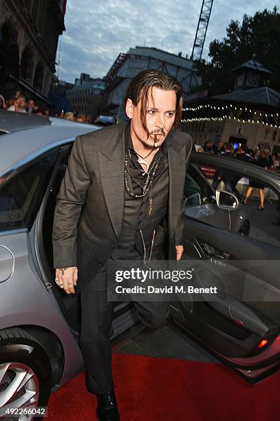 Johnny Depp attends the Virgin Atlantic gala screening of "Black Mass" during the BFI London Film Festival at Odeon Leicester Square on October 11,...