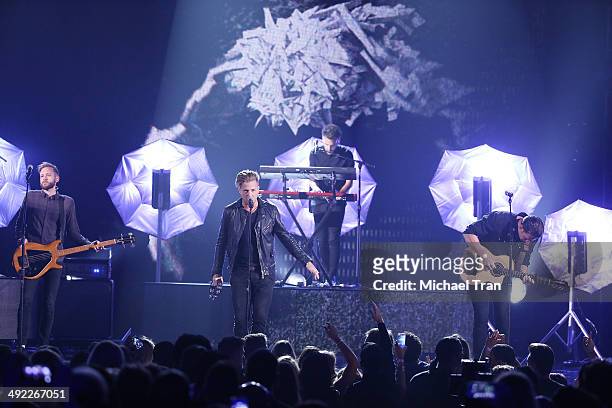 OneRepublic perform onstage during the 2014 Billboard Music Awards held at MGM Grand Garden Arena on May 18, 2014 in Las Vegas, Nevada.