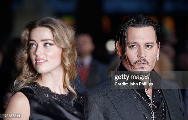 Amber Heard and Johnny Depp attend the "Black Mass" Virgin Atlantic Gala screening during the BFI London Film Festival, at Odeon Leicester Square on...