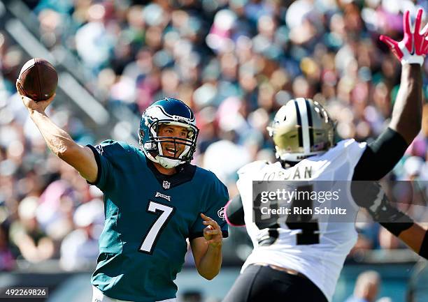 Quarterback Sam Bradford of the Philadelphia Eagles passes as Cameron Jordan of the New Orleans Saints defends in the first quarter during a game at...