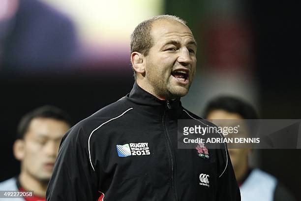 Japan coach Steve Borthwick watches the warm-up ahead of the Pool B match of the 2015 Rugby World Cup between USA and Japan at Kingsholm stadium in...