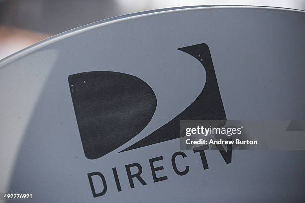 DirecTV sattelite dish sits on a roof on May 19, 2014 in New York City. AT&T agreed May 18, to buy DirecTV for $48.5 billion.