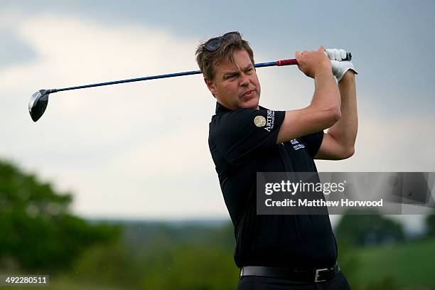 Businessman Peter Jones tees off during the Mike Tindall Celebrity Golf Classic in support of Rugby for Heroes and the On Course Foundation at Celtic...