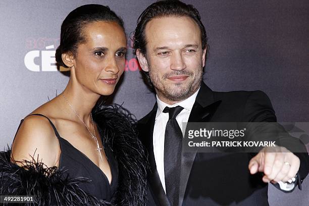 Swiss actor actor Vincent Perez and his wife Karine Silla arrive to attend the 36th Cesar awards ceremony on February 25, 2011 at the Chatelet...