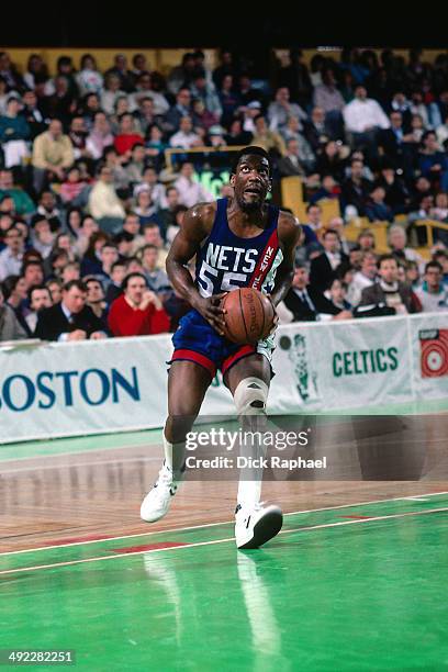 Albert King of the New Jersey Nets goes up for the layup against the Boston Celtics during a game circa 1986 at the Boston Garden in Boston,...