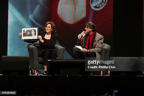 Actress Sigourney Weaver and host Derek Maki discusses Sigourney's career in the "Spotlight on Sigourney Weaver" panel discussion at the Stampede...
