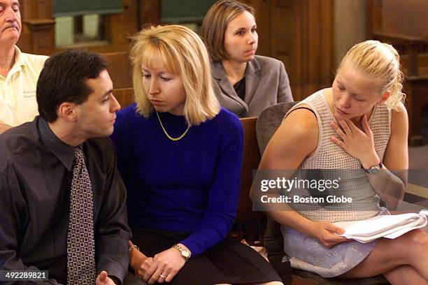 Dr. Dirk Greineder's son, Colin, left, and daughters, Kirsten, center, and Britt, right, attended his trial at Norfolk Superior Court on June 6,...