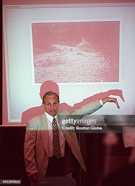 Dr. Dirk Greineder speaks in front of a projected image of the Morses Pond area in Wellesley as he testifies while on trial for the murder of his...