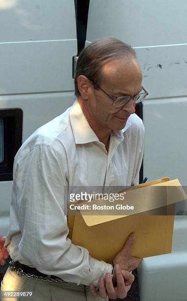 Dr. Dirk K. Greineder makes his way into Norfolk Superior Court on the morning of June 28, 2001. Greineder, an allergist at Brigham and Womens...