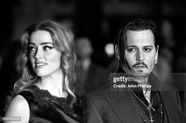 Amber Heard and Johnny Depp attend the "Black Mass" Virgin Atlantic Gala screening during the BFI London Film Festival, at Odeon Leicester Square on...