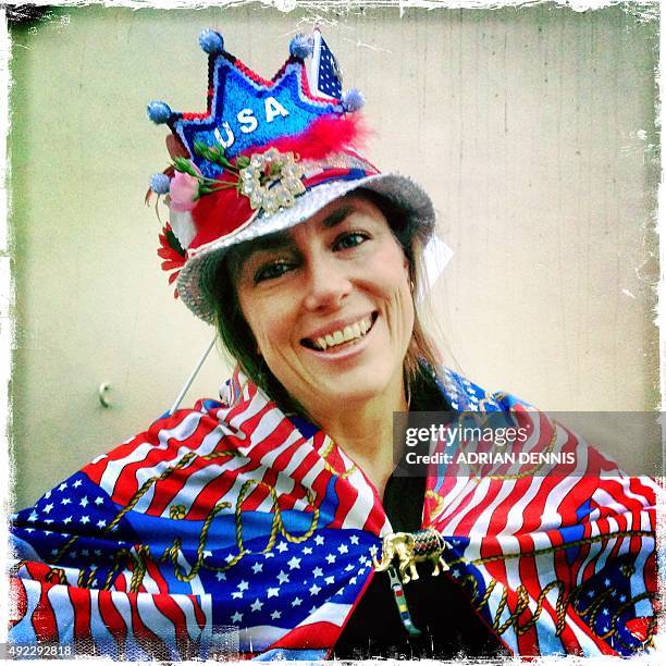 Photo taken with a mobile phone shows rugby fan Annie from Lander, Wyoming, posing for a photograph prior to the Pool B match of the 2015 Rugby World...