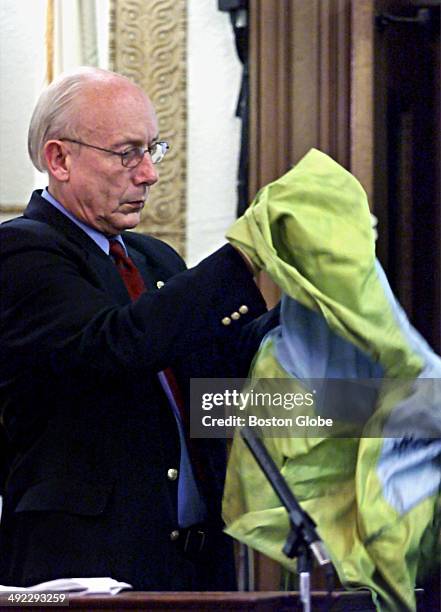 Forensic scientist Stuart James, of Florida, talks about blood found on the jacket of Dr. Dirk Greineder during testimony at at Norfolk Superior...