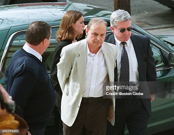 Dr. Dirk Greineder, of Wellesley, accused of murdering his wife, is led into Norfolk Superior Court in Dedham, Mass. Fork arraignment on March 1,...