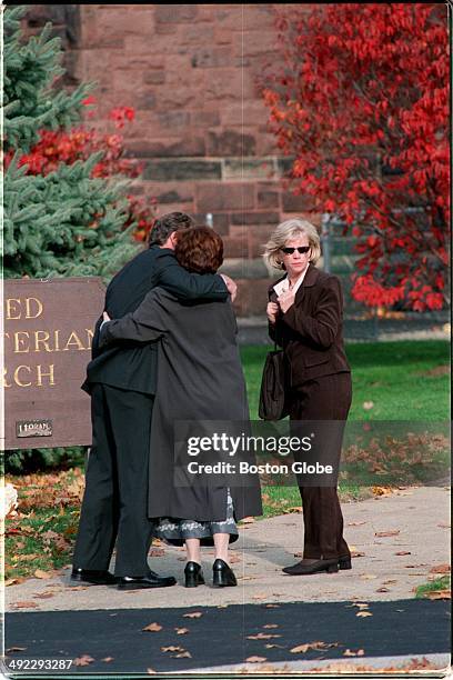 Outside of the Newton Presbyterian Church, friends of Mabel "May" Greineder, who was killed in a Wellesley park, arrive for her memorial service on...