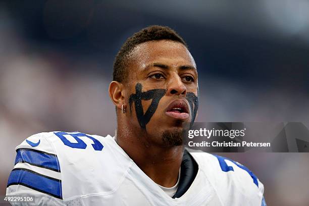 Defensive end Greg Hardy of the Dallas Cowboys on the sidelines before a game against the New England Patriots at AT&T Stadium on October 11, 2015 in...