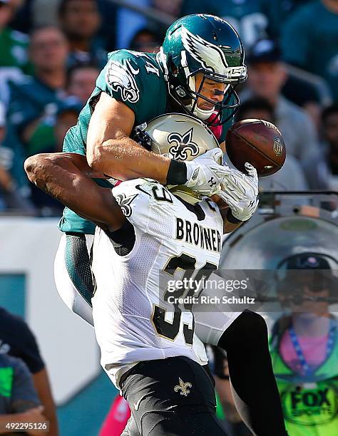 Riley Cooper of the Philadelphia Eagles attempts to make a catch that is broken up by Brandon Browner of the New Orleans Saints in the third quarter...