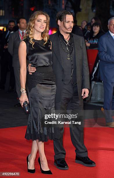 Amber Heard and Johnny Depp attend a screening of "Black Mass" during the BFI London Film Festival at Odeon Leicester Square on October 11, 2015 in...