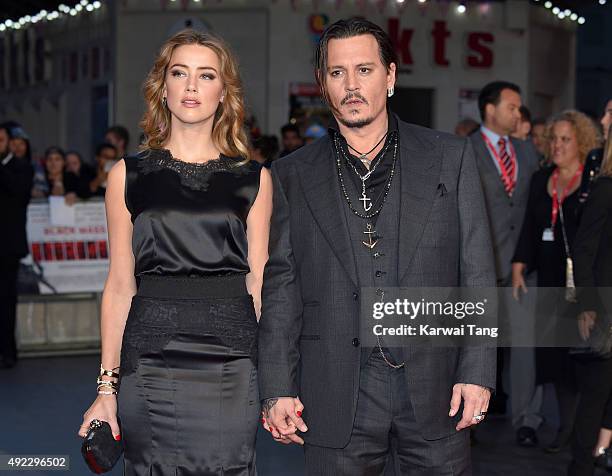 Amber Heard and Johnny Depp attend a screening of "Black Mass" during the BFI London Film Festival at Odeon Leicester Square on October 11, 2015 in...