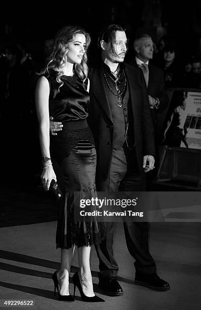 Amber Heard and Johnny Depp attend a screening of "Black Mass" during the BFI London Film Festival at Odeon Leicester Square on October 11, 2015 in...