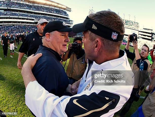 Head coach Chip Kelly of the Philadelphia Eagles greets head coach Sean Payton of the New Orleans Saints after their football game at Lincoln...