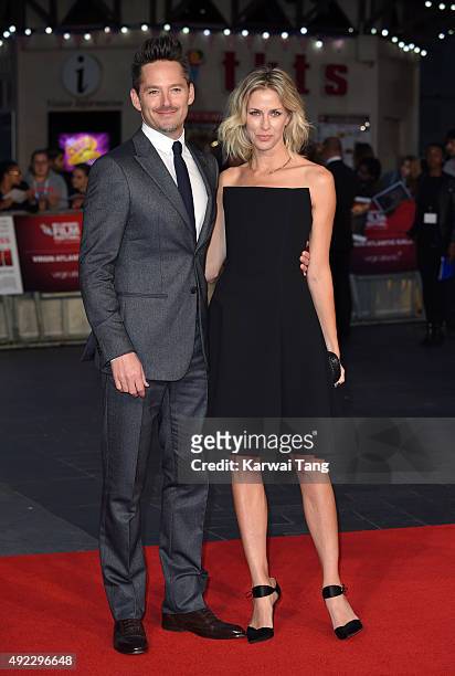 Scott Cooper and wife Jocelyne Cooper attend a screening of "Black Mass" during the BFI London Film Festival at Odeon Leicester Square on October 11,...