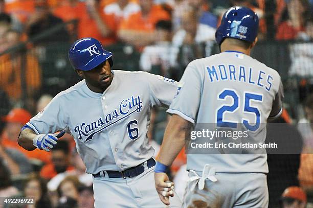 Lorenzo Cain of the Kansas City Royals celebrates with Kendrys Morales of the Kansas City Royals after hitting a solo home run in the fourth inning...