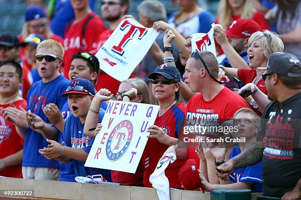 Texas Rangers fans cheer during batting practice prior to Game 3 of the ALDS against the Toronto Blue Jays at Globe Life Park on Sunday, October 11,...