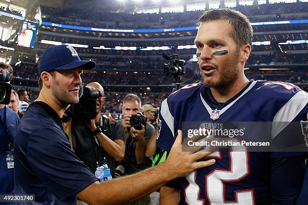 Quarterback Tom Brady of the New England Patriots is congratulated by Tony Romo of the Dallas Cowboys after the Patriots defeated the Cowboys 30-6 in...