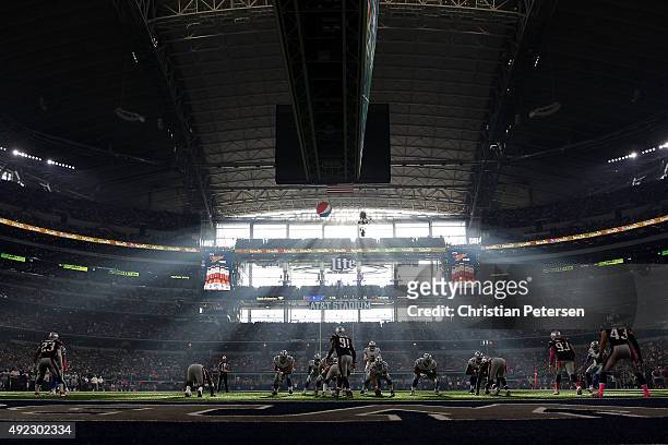 Quarterback Brandon Weeden of the Dallas Cowboys prepares to snap the football during the second half of the NFL game against the New England...