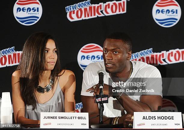 Jurnee Smollett-Bell and Aldis Hodge attend the 'Underground' panel during New York Comic-Con 2015 at The Jacob K. Javits Convention Center on...