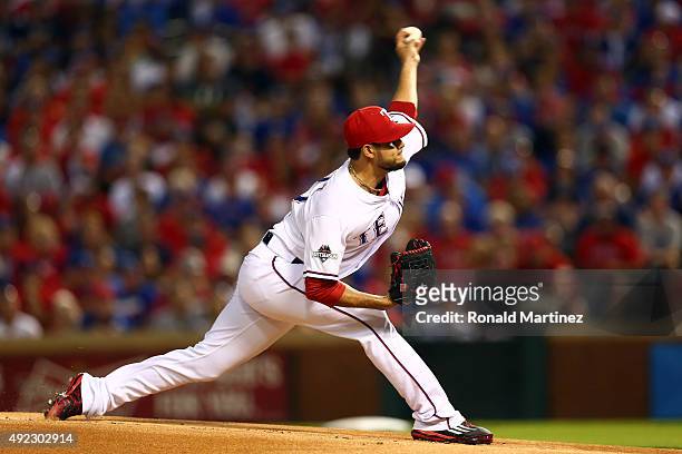 Martin Perez of the Texas Rangers throws a pitch in the first inning against the Toronto Blue Jays during game three of the American League Division...