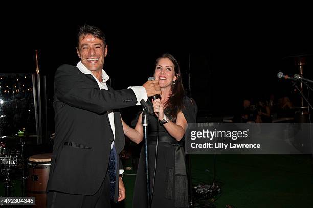 Singer Dario and Kira Reed Lorsch make an announcement at Victorino Noval's birthday celebration at The Vineyard Beverly Hills on October 10, 2015 in...