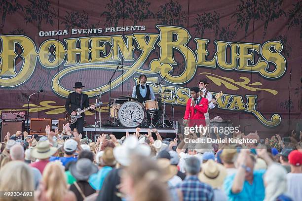 Musicians Nalle Colt, Ty Taylor, Richard Danielson, and Rick Barrio Dill of Vintage Trouble perform on stage at Doheny State Beach on May 18, 2014 in...