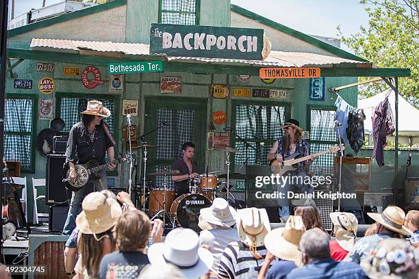 Musicians Eric Sardinas, Bryan Keeling, and Levell Price perform on stage with Eric Sardinas & Big Motor at Doheny State Beach on May 18, 2014 in...