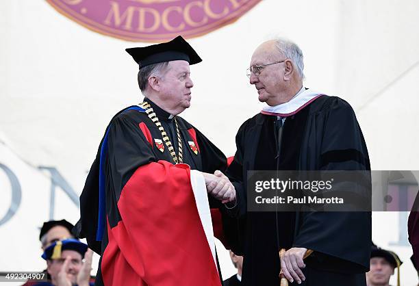 Former Boston Celtics player and basketball Hall of Famer Bob Cousy received an honory degree from B.C. President William Leahy at Boston College's...