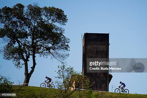 Athletes compete in the International Mountain Bike Challenge at the Deodoro Sports Complex on October 11, 2015 in Rio de Janeiro, Brazil. Some of...