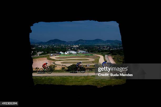 Athletes compete in the International Mountain Bike Challenge at the Deodoro Sports Complex on October 11, 2015 in Rio de Janeiro, Brazil. Some of...