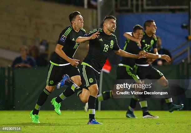 Hector Herrera, Oribe Peralta, Javier Hernandez and Paul Aguilar of Mexico celebrate Peralta's goal in the first half of extra time against the the...
