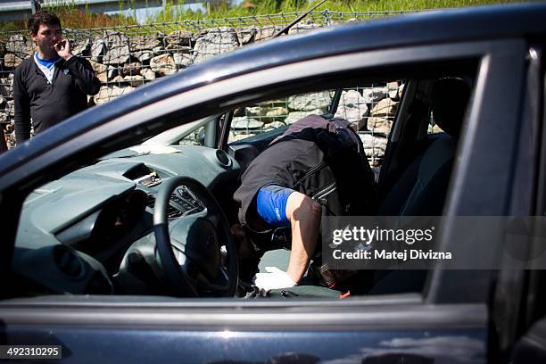 An officer of Bavaria police, with the attendance of officers of Czech police, checks a car while patrolling for crystal meth and other contraband...