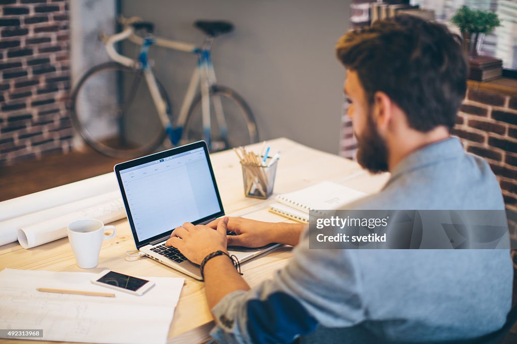 Man working at modern office.