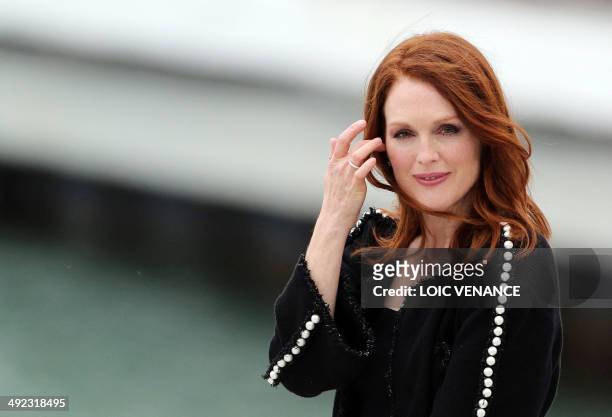 Actress Julianne Moore looks on as she takes part in a show on the set of the French tv channel Canal Plus, on the sidelines of the 67th edition of...