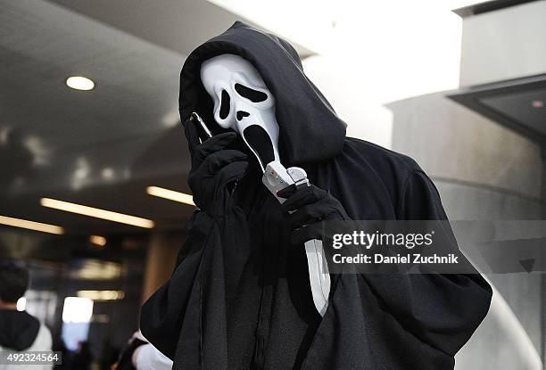 Comic Con attendee poses as Ghostface from Scream during New York Comic-Con 2015 at The Jacob K. Javits Convention Center on October 11, 2015 in New...