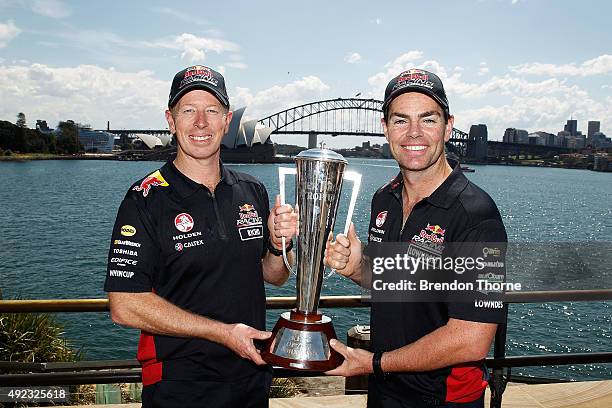 Steven Richards and Craig Lowndes poses with the Peter Brock Trophy at Mrs Macquarie's Chair on October 12, 2015 in Sydney, Australia. Lowndes and...