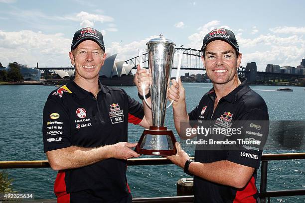 Steven Richards and Craig Lowndes poses with the Peter Brock Trophy at Mrs Macquarie's Chair on October 12, 2015 in Sydney, Australia. Lowndes and...