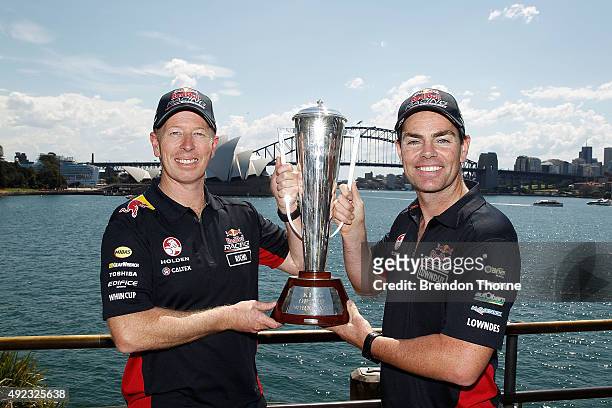 Steven Richards and Craig Lowndes poses with the Peter Brock Trophy at Mrs Macquarie's Chair on October 12, 2015 in Sydney, Australia. Lowndes and...