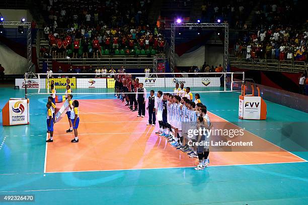 Teams of Venezuela and Argentina line up prior to a match between Venezuela and Argentina as part of Men Pre Olympic Venezuela 2015 at Coliseo...