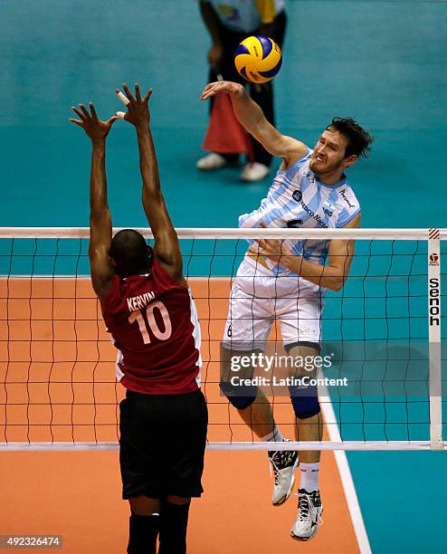 Cristian Poglajen of Argentina spikes the ball during a match between Venezuela and Argentina as part of Men Pre Olympic Venezuela 2015 at Coliseo...