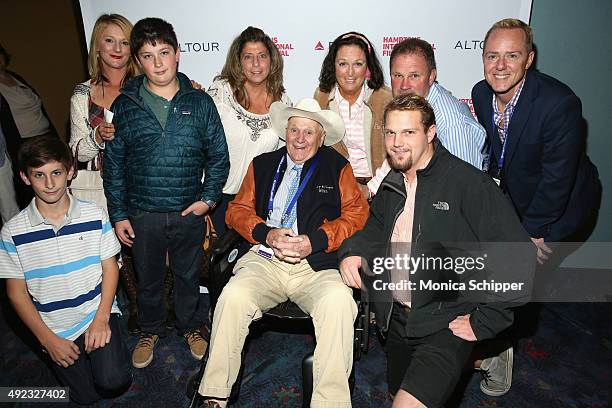 Film subject horse rider Harry DeLeyer and Director Ron Davis pose for a photo with guests at 'Harry & Snowman ' photo call on Day 4 of the 23rd...