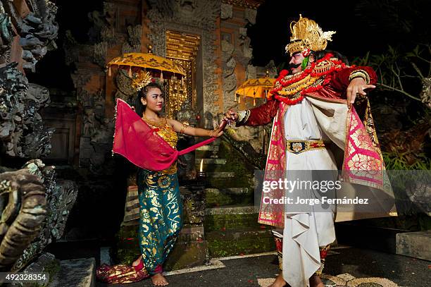 Rahwana demon and Sita princess characters of the Taman Kaja troup posing after a show.